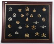 A Frame of British Military Cap Badges.