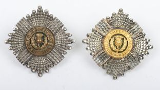 Two Scots Guards Officer's Silver Gilt & Enamelled Cap Stars.