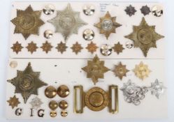 Assortment of British Military Badges pertaining to the Irish Guards.