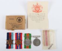 A Second World War group of 4 medals for service in North Africa.