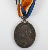 An Edwardian Territorial Force Efficiency Medal to the Highland Battery Royal Garrison Artillery.