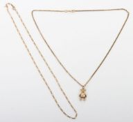 A 9ct bear on 9ct chain with another 9ct chain,