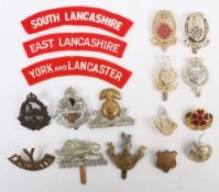 Small Collection of Military Badges & Cloth Shoulder Titles to Lancashire Regiments.