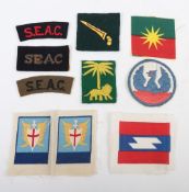 Small Grouping of South East Asia Cloth Formation Badges & Shoulder Titles.