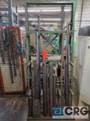 Assorted round steel stock with steel rack