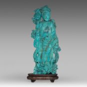 A Chinese turquoise carving of a female Immortal, fixed on a wooden base, total H 31,5 cm - total we