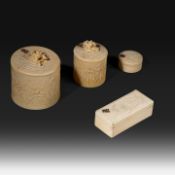 A collection of fine ivory Art Nouveau boxes with decoration of irises, all carrying the initials W.