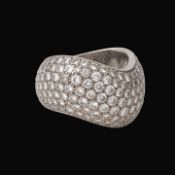 A Cartier 'Wave' 18ct white gold ring and diamonds, weight: 18,1 g (+)