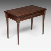 A Louis XVI style extendable casino games table, mahogany veneered with gilt bronze mounts, attrib.