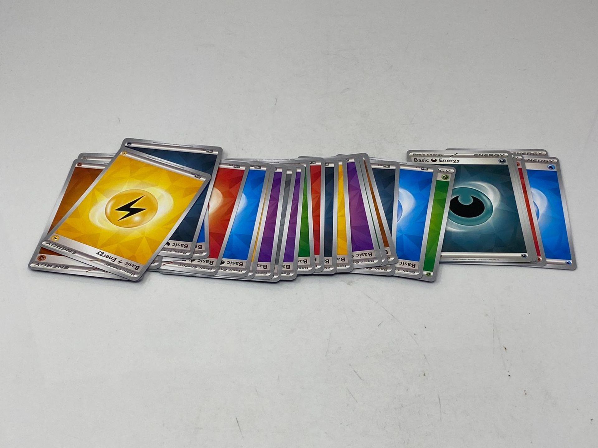 Pokémon TCG: Kanto Friends Mini Tin 5-Pack Bundle (10 Booster Packs, 5 Coins, 5 Art Cards) - Image 4 of 4