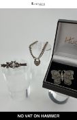 A Collection of Three Silver Jewellery Pieces including a Charm Bracelet and Two Brooches