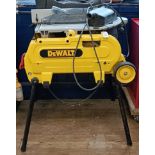 A DeWalt cutting table When plugged in it will run. We do not guarantee this Untested and no