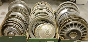 Assorted car wheel trims, including Triumph (3 boxes) Collection from DT2 0PR will be on auction day