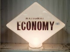 An opaque glass pump globe, National Economy, 49 cm high Chip repaired to the collar, faded on