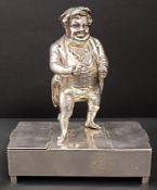 A Victorian silver novelty condiment stand, in the form of a Dickens character, Charles Edward