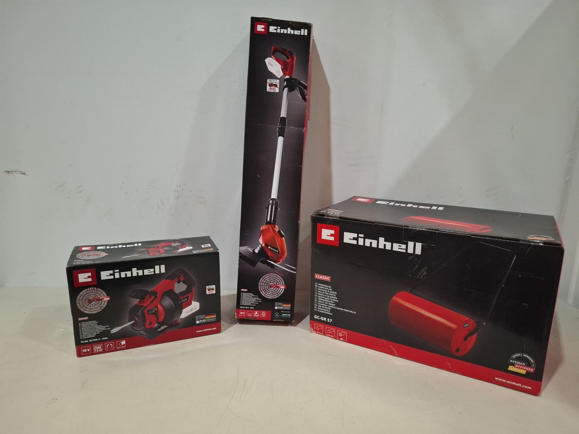 3 X BRAND NEW IN BOX EINHELL LOT CONTAINING 1 X CORDLESS DRAIN AUGER TE-DA 18/760, 1 X LAWN ROLLER G