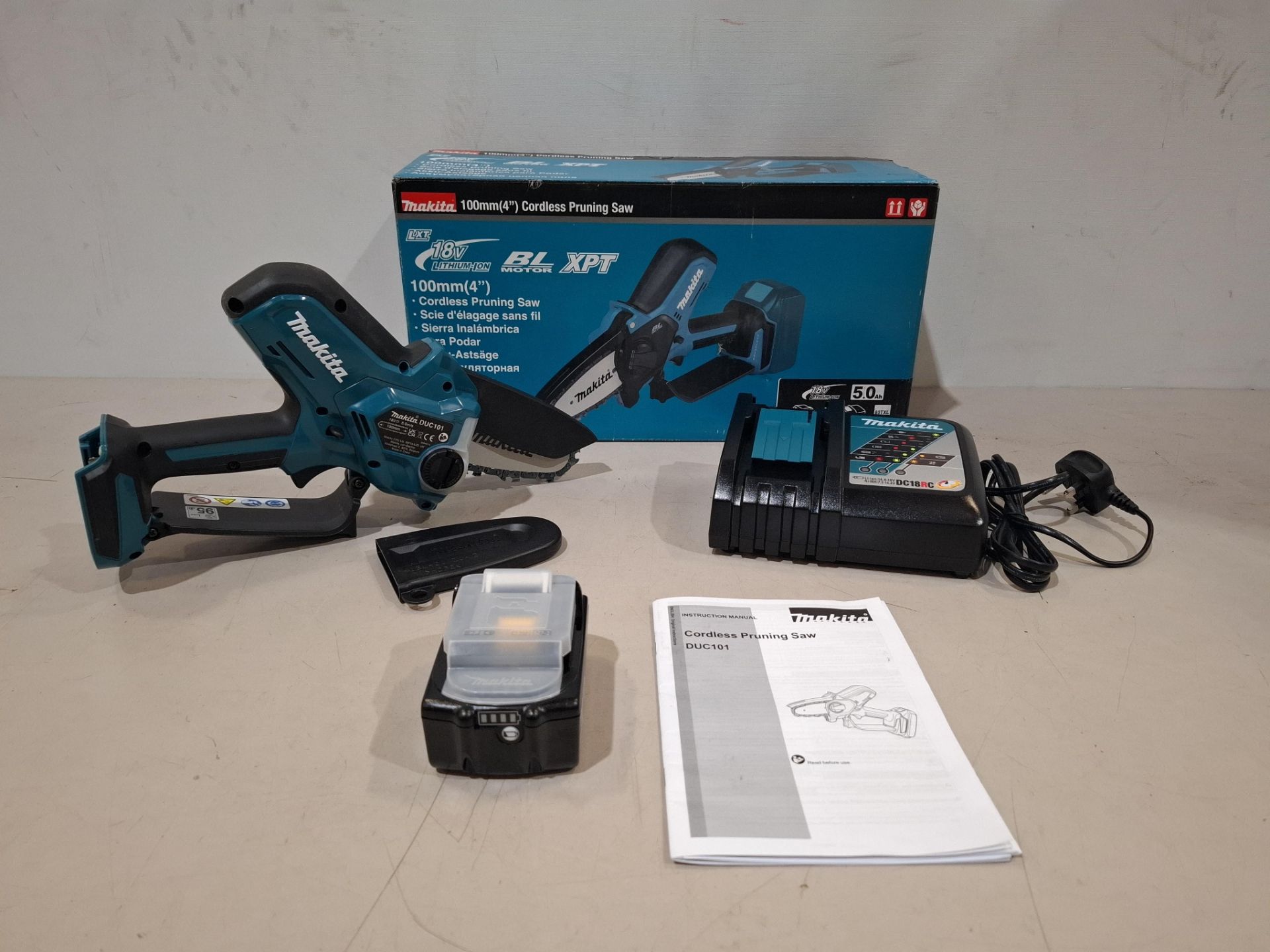 1 X BRAND NEW MAKITA 100MM CORDLESS PRUNING SAW BATTERY AND CHARGER INCLUDED  ​​​​​​​DUC101RT