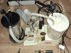 1 X TENCO ENOLMATIC VACUUM BOTTLE FILLER EQUIPPED WITH A TANDEM FILTER ASSEMBLY USED FOR BOTTLING AN