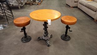 1 X INDUSTRIAL - STYLE BAR STOOLS AND MATCHING TABLE WITH ROUND WOODEN TOPS AND HEAVY BLACK CAST