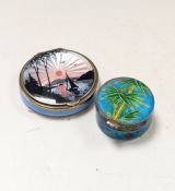 A compact, together with a pill box,