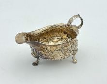 A George II silver sauce boat,