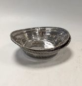 A pair of silver bon bon dishes,