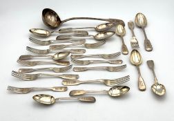 A 23-piece harlequin set of mainly Victorian silver flatware,