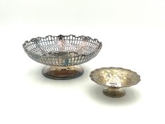 A pierced silver pedestal bowl together with a small Mappin & Webb silver 'scale' dish,