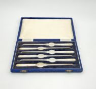 An Elizabeth II set of six silver shellfish picks,