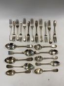 A near set of silver flatware,