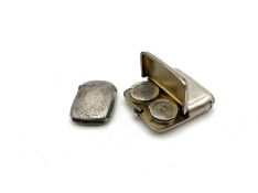 Two silver vesta cases, together with a sovereign case,