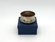 An Elizabeth II silver coaster,