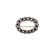 An oval shaped brooch set with old brilliant cut diamonds, estimated approximate total diamond