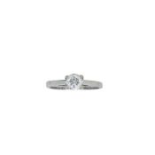 An 18ct gold single stone diamond ring, known stamped diamond weight 0.52ct, size K, hallmarked 18ct