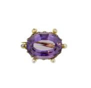 An amethyst and pearl brooch, dimensions 2.6 x 1.8cm, pin and roller catch fitting, unmarked, tested