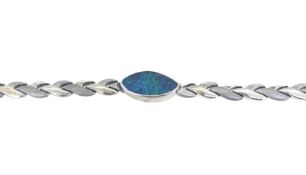 A boulder opal bracelet, marquise shaped opal (possibly sugar treated), chevron style links,