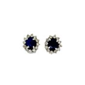A pair of sapphire and diamond cluster ear studs, dimensions 10.3 x 9mm, post and scroll fittings,