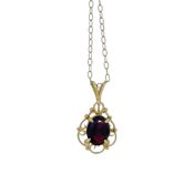 A 9ct gold garnet pendant and chain, length of pendant including bale 2.1cm, hallmarked 9ct gold,