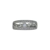 A diamond set tapered band, size P, stamped '10K', weight 3.8g