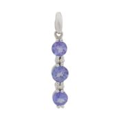 A tanzanite and white sapphire pendant 18ct white gold