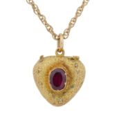 A garnet mourning pendant necklace Yellow metal