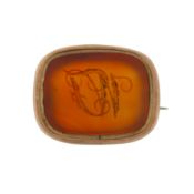 A carnelian monogrammed brooch Yellow metal