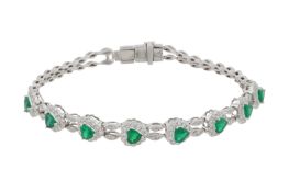 A synthetic emerald and diamond bracelet White metal