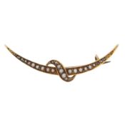 A seed pearl crescent brooch 15ct yellow gold