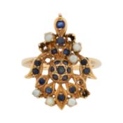 A sapphire and seed pearl ring