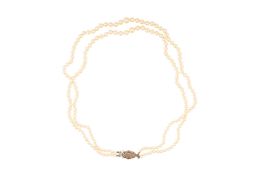 A double strand pearl necklace White metal