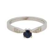 A sapphire and diamond ring 9 carat white gold