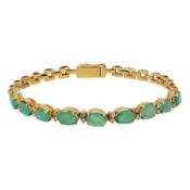 An emerald and diamond bracelet Yellow metal