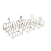 Birmingham 1964 by William Suckling Ltd A set of four Elizabeth II sterling silver toast racks