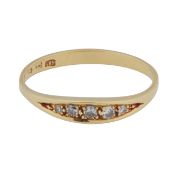 A five-stone diamond ring Yellow metal